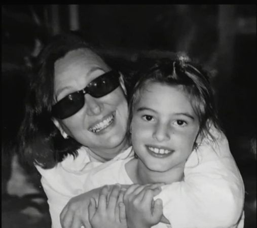 An old picture of Marilisa Maronesse's older sister Anna Maronesse with her niece Lele Pons. 